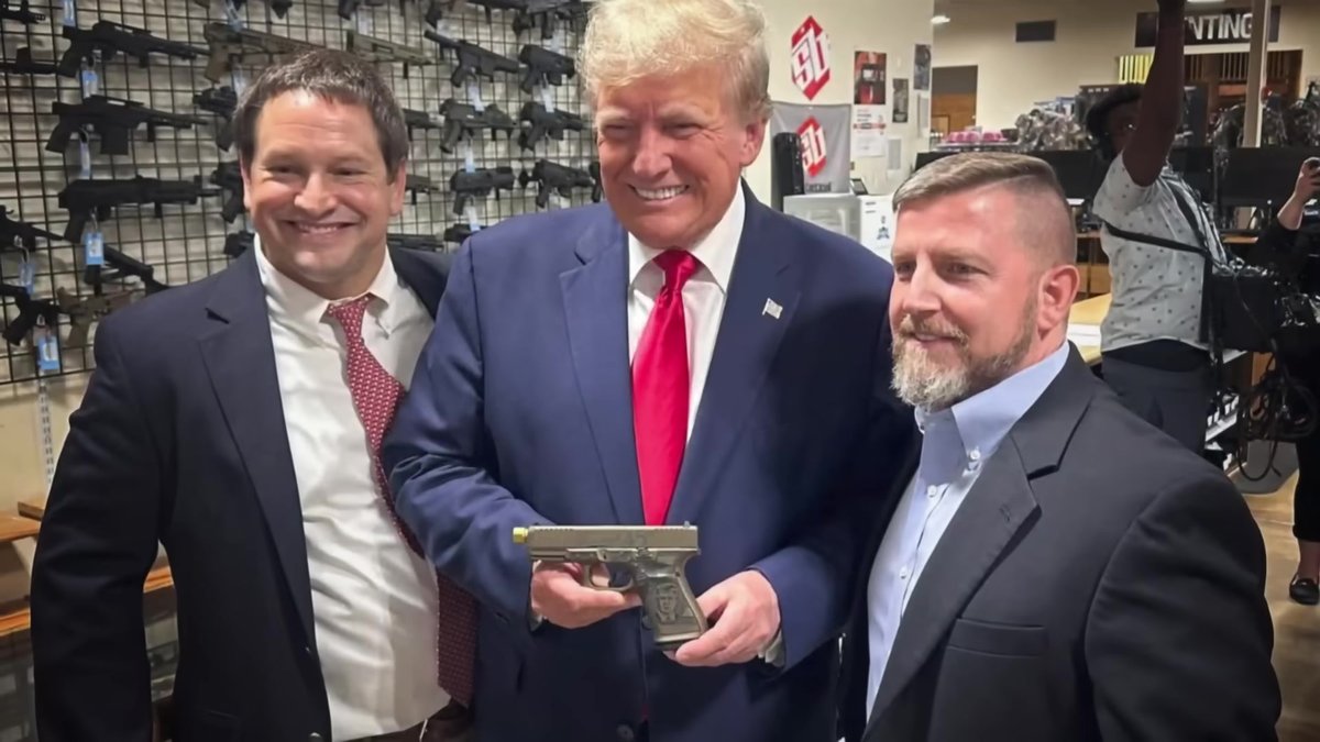 AC Wore a Red Tie to Talk About Trump Buying a Glock and We’re Swooning