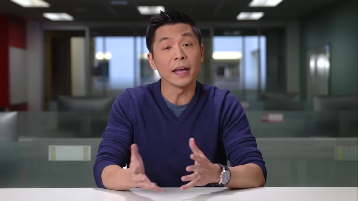 Andrew Chang Lectures on International Students in a Navy Sweater That Just Enrolled in Style 101